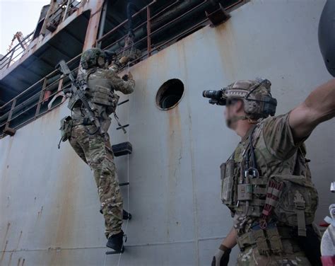 Navy Equipment Operator working on equipment