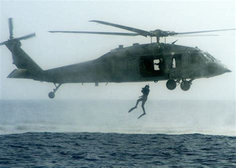 Navy Aviation Rescue Swimmers with MH-60 Seahawk