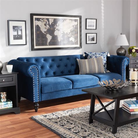 Navy Blue Sofa in a rustic living room