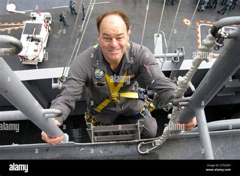 Navy crew wearing safety harnesses