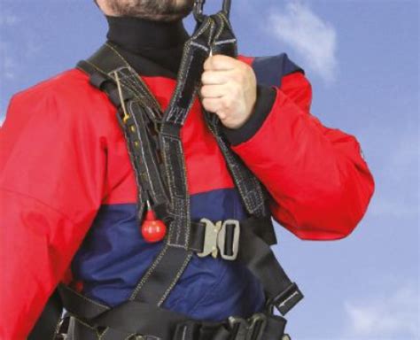 Navy crew wearing safety harnesses