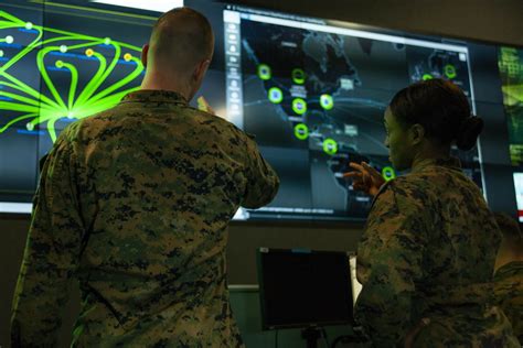 Navy Cybersecurity Officer Working on Computer