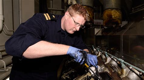 Navy engineer in a meeting