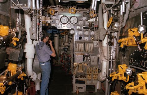 Navy engineer working on a ship