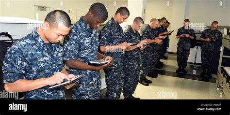 Navy Recruits Studying