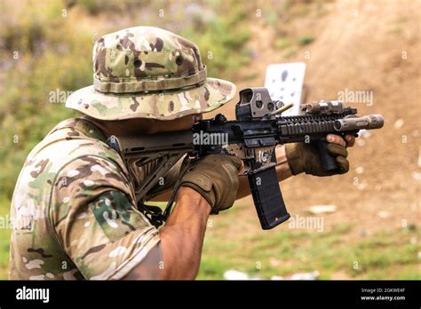 Navy SEAL with an MK 18 rifle