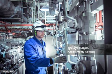 Nuclear Engineer Inspecting Equipment in a Reactor