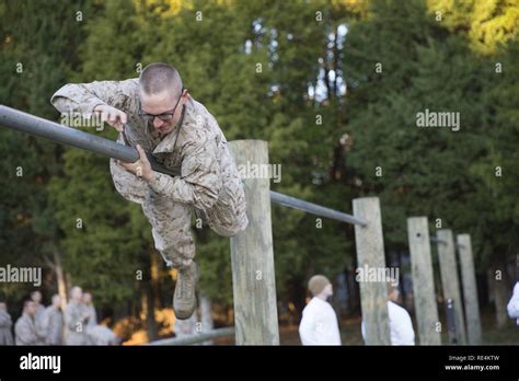 OCS Candidates Completing Obstacle Course