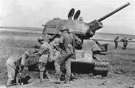 A German Tiger I tank moves through a field during the Battle of Kursk