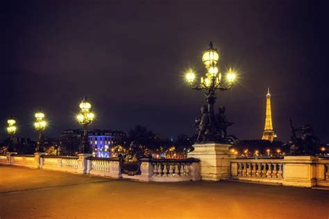 Paris at night, with the Eiffel Tower illuminated