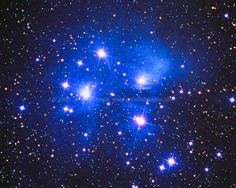 A stunning photo of the Pleiades star cluster, showcasing its breathtaking beauty