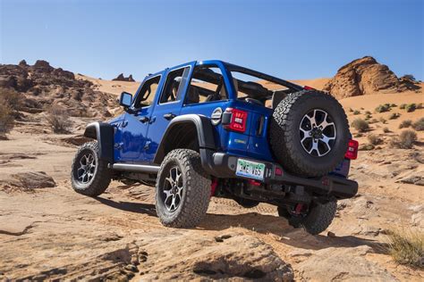 A 4x4 SUV driving on a rugged terrain