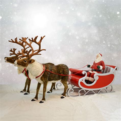 Santa's reindeer pulling the sleigh, with a snowy landscape in the background