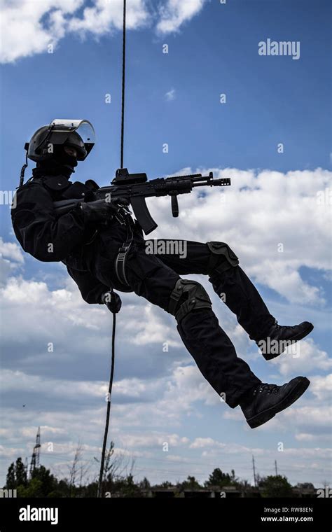 Special Forces soldier rappelling