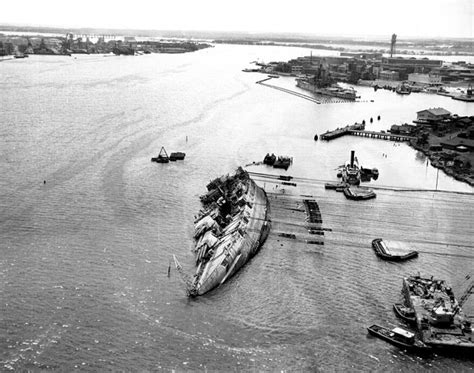 The USS Oklahoma righted and afloat, June 1943