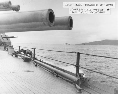 USS West Virginia firing its guns