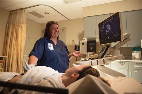 Ultrasound Technician Providing Patient Care