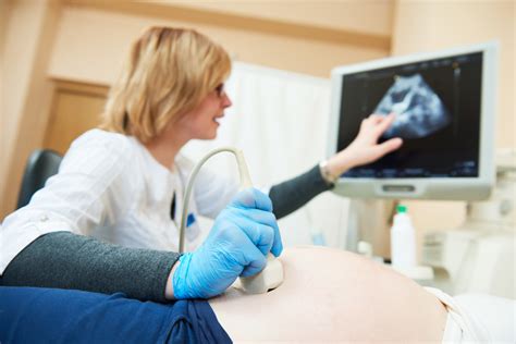 Ultrasound Technicians Helping Patients