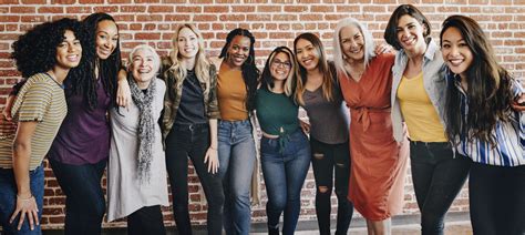 Women supporting and uplifting each other in a display of sisterhood and camaraderie