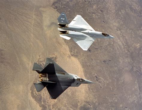 YF-23 and F-22 in flight