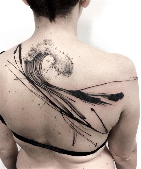 Abstract back tattoos for women