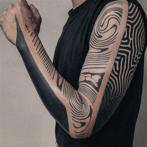 Abstract patterns leg sleeve tattoo