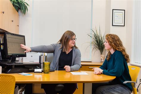 Academic advisor advising a student