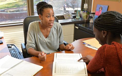 Academic advisor advising a student