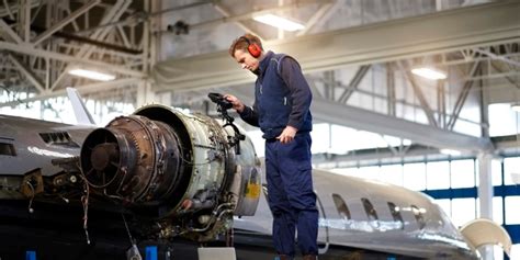 Aerospace engineers working on a project