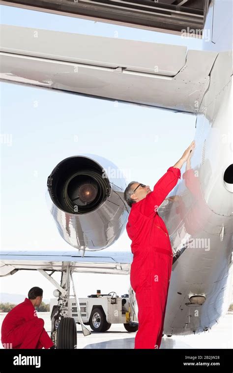 Aerospace Engineering Professionals Inspecting