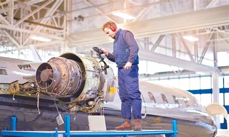 Aerospace Engineers Working with Computers