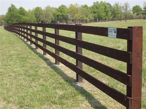 Agricultural posts supporting a fence