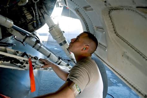 An Air Force airplane mechanic in a flight suit