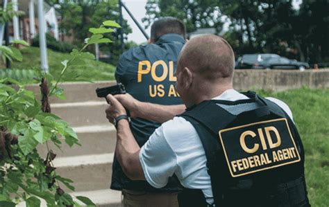 Air Force CID agents investigating a crime scene