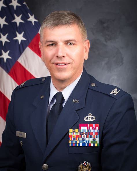 Air Force colonel working with a team