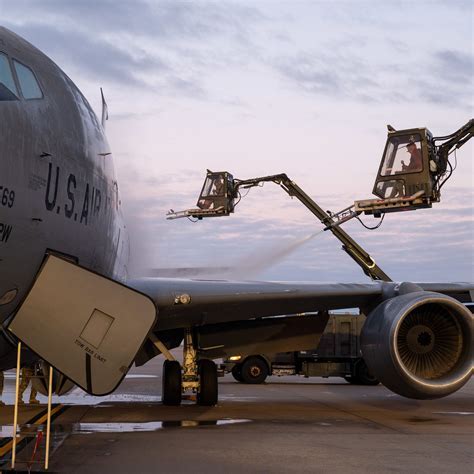 An Air Force recruiter administering the ASVAB test