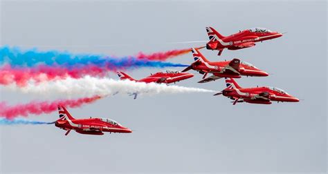 A photo of a crowd enjoying an air show