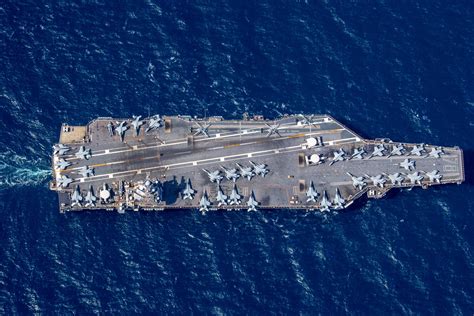 Aircraft carrier in heavy seas