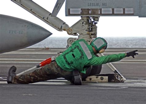 Aircraft carrier crew at work image