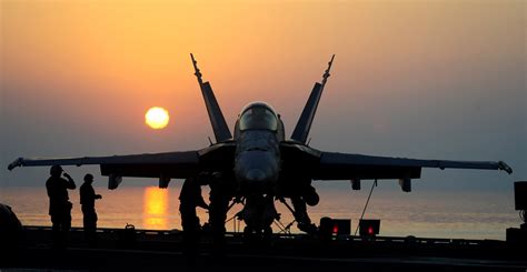 Aircraft Carrier Landing at Sunset