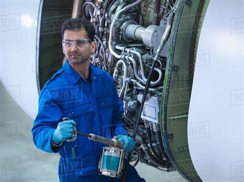 Aircraft Mechanic in shop uniform