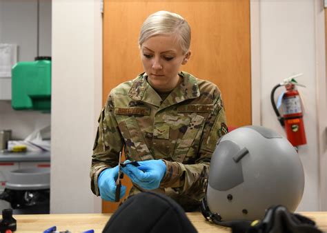 Aircrew Flight Equipment Specialist working with pilots