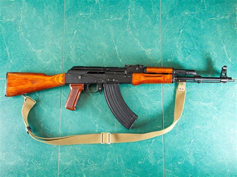 AK 47 rifle on a wooden table