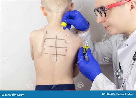 An allergist testing a patient