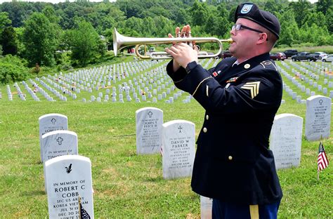 A soldier blowing a bugle in a historical setting