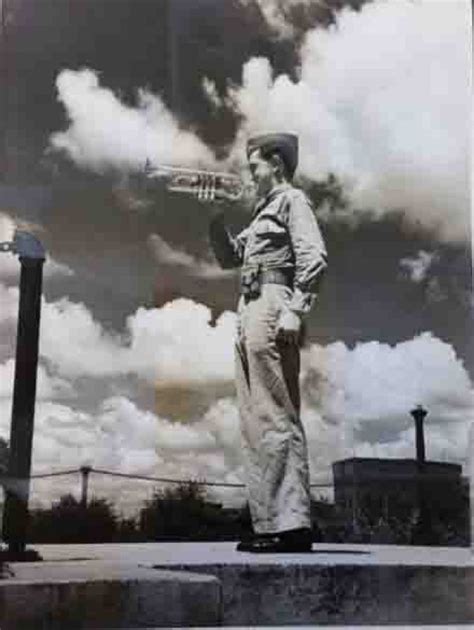 A bugle being played during a military ceremony