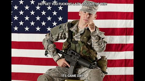 A soldier blows a bugle to signal the start of the day