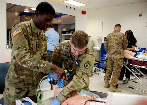 Army Medic Working with Patients