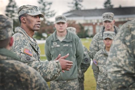 Army officers leading troops in combat