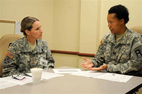 A person in a military uniform with a background check report